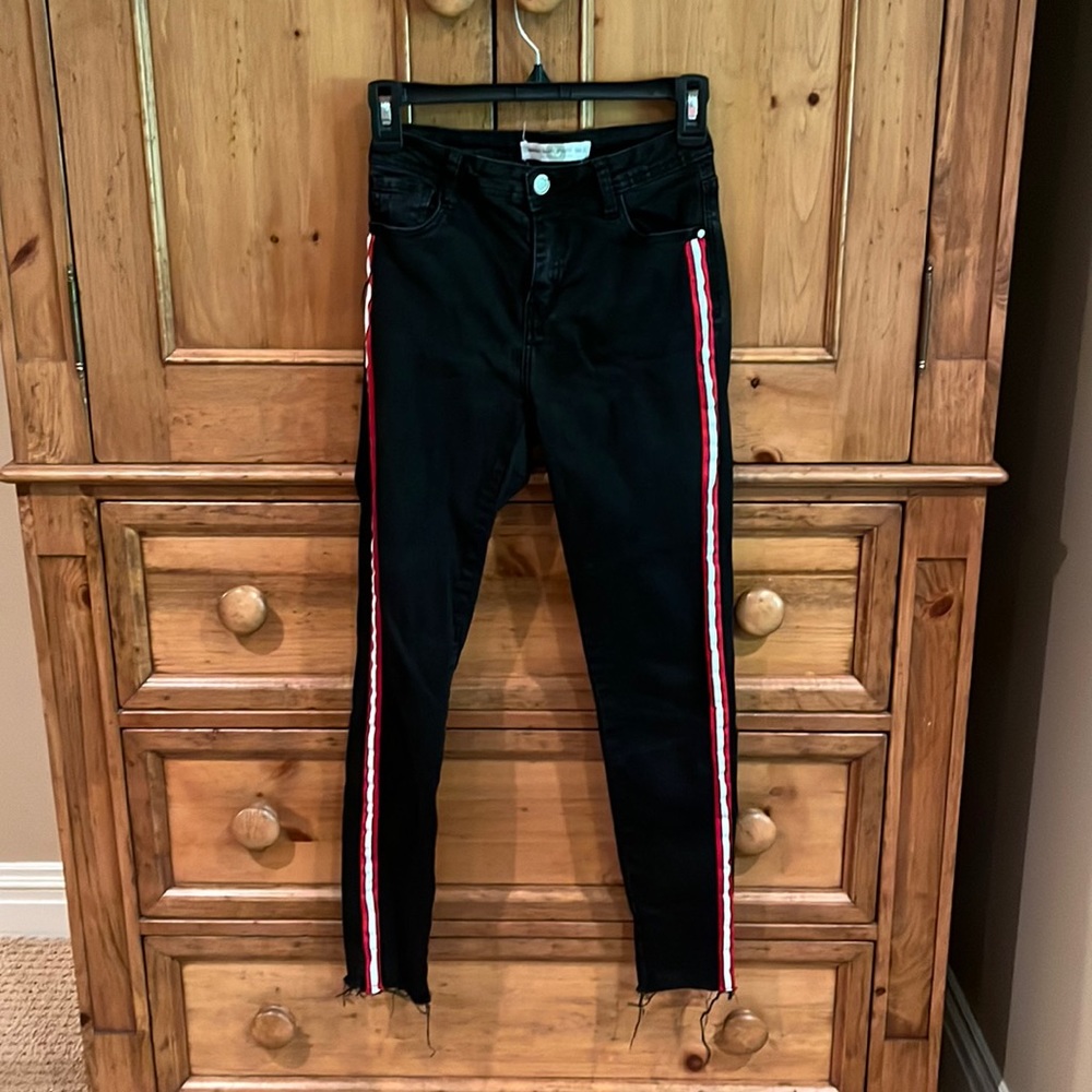 I&M black skinny jeans with red and white stripe